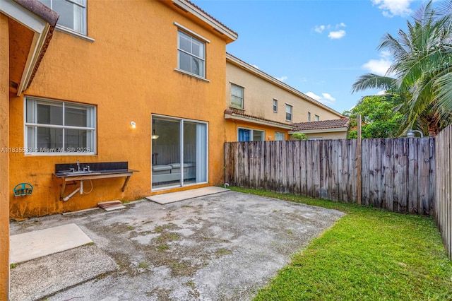 771 SE 2nd St, Homestead, FL 33030 - fenced backyard with a patio