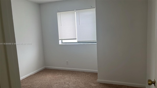 5200 NW 31st Ave Unit 217, Fort Lauderdale, FL 33309 - spare room with carpet flooring and baseboards