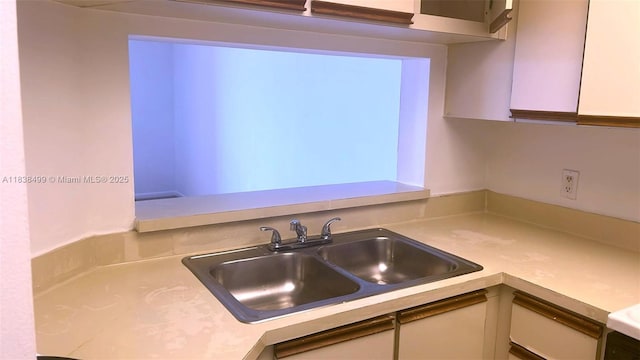 5200 NW 31st Ave Unit 217, Fort Lauderdale, FL 33309 - kitchen with light countertops and white cabinetry