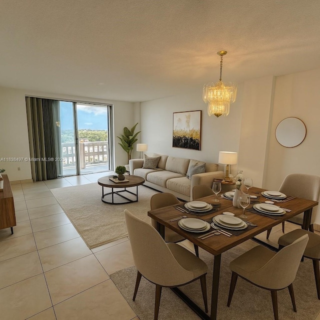 15600 NW 7th Ave Unit 807, Miami, FL 33169 - dining space featuring a chandelier, light tile patterned flooring, and a textured ceiling