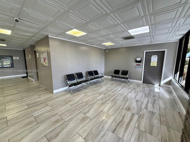 15600 NW 7th Ave Unit 807, Miami, FL 33169 - common area featuring a security system and an ornate ceiling