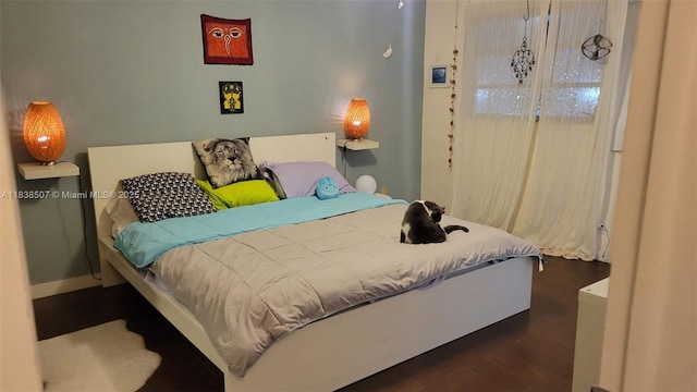 200 NE 12th Ave Unit 7B, Hallandale Beach, FL 33009 - bedroom with dark wood-type flooring