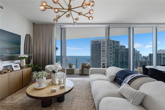 300 Biscayne Blvd Way Unit 4707, Miami, FL 33131 - living room featuring a chandelier, a water view, and a wall of windows