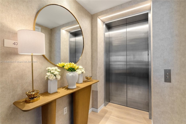 300 Biscayne Blvd Way Unit 4707, Miami, FL 33131 - hallway with elevator and wood finished floors