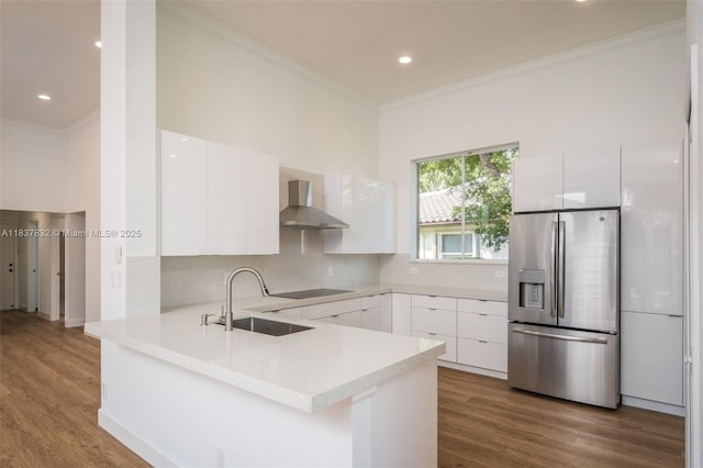 2664 Edgewater Dr, Weston, FL 33332 - kitchen featuring stainless steel fridge with ice dispenser, wall chimney exhaust hood, modern cabinets, crown molding, and recessed lighting
