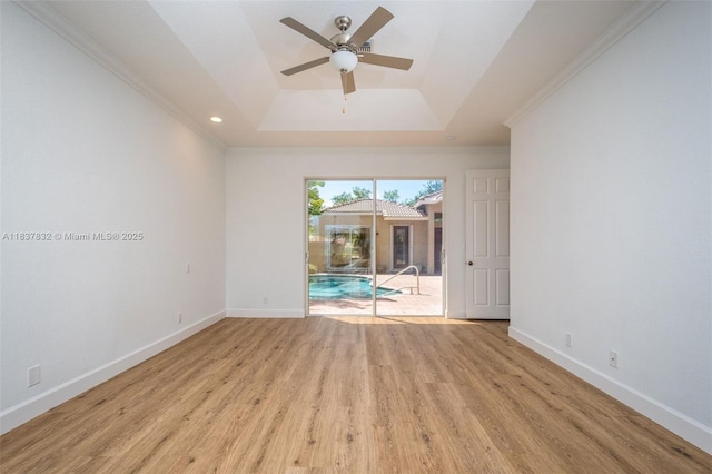 2664 Edgewater Dr, Weston, FL 33332 - empty room featuring ceiling fan, a raised ceiling, wood finished floors, crown molding, and recessed lighting