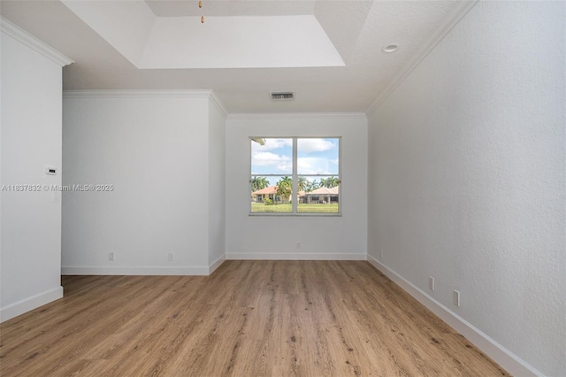 2664 Edgewater Dr, Weston, FL 33332 - spare room featuring light wood-style floors, crown molding, and a skylight