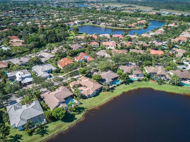 2664 Edgewater Dr, Weston, FL 33332 - aerial view of property and surrounding area with nearby suburban area and a large body of water