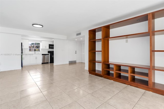 7304 SW 82nd St Unit A107, Miami, FL 33143 - spare room featuring light tile patterned floors