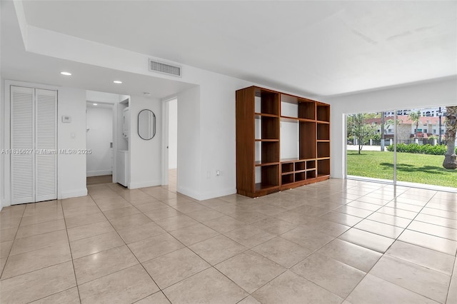 7304 SW 82nd St Unit A107, Miami, FL 33143 - spare room featuring light tile patterned flooring and recessed lighting