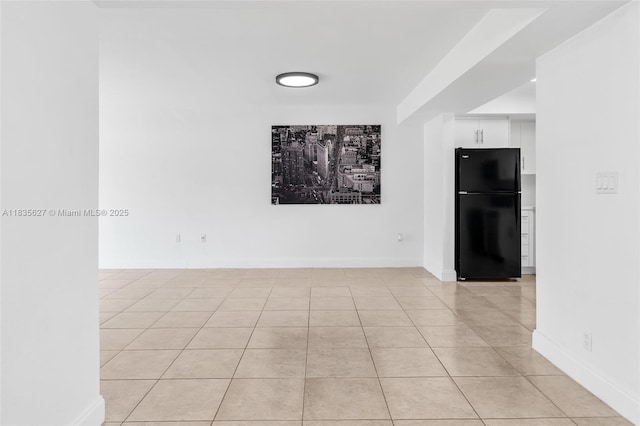 7304 SW 82nd St Unit A107, Miami, FL 33143 - empty room featuring light tile patterned flooring