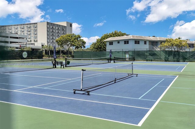 7304 SW 82nd St Unit A107, Miami, FL 33143 - view of tennis court with community basketball court