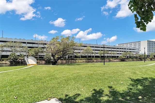 7304 SW 82nd St Unit A107, Miami, FL 33143 - view of property's community with a yard and a water view