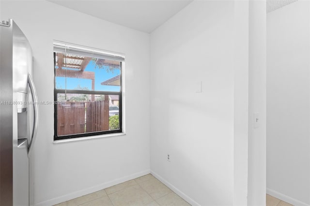 3057 NW 109th Ave Unit 3057, Sunrise, FL 33322 - empty room with arched walkways and tile patterned flooring