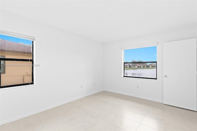 3057 NW 109th Ave Unit 3057, Sunrise, FL 33322 - unfurnished room with healthy amount of natural light