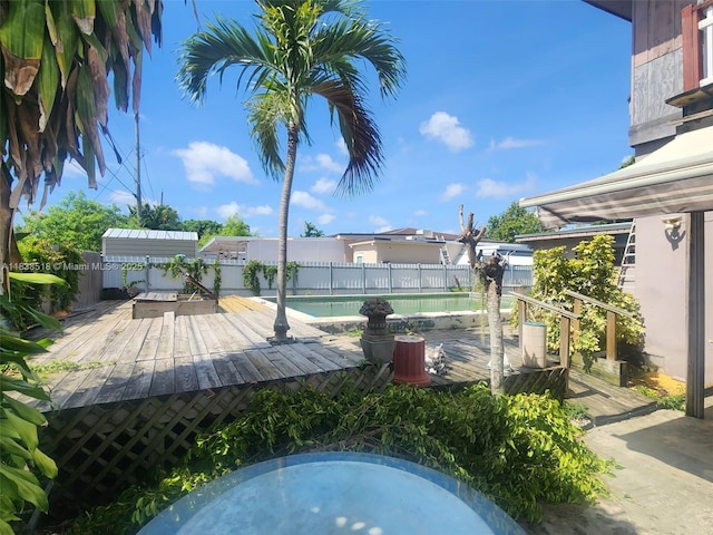 935 SW 72nd Ave, Miami, FL 33144 - fenced backyard with a wooden deck