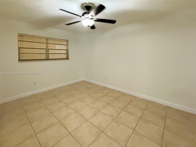 8650 SW 109th Ave Unit 3-112, Miami, FL 33173 - empty room featuring a textured ceiling and a ceiling fan