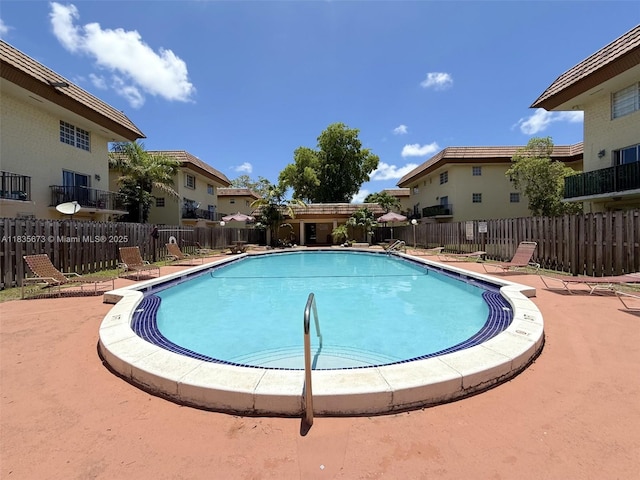 8650 SW 109th Ave Unit 3-112, Miami, FL 33173 - community pool featuring a residential view and a patio area