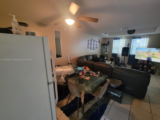 1640 NE 5th St, Homestead, FL 33033 - living area with light tile patterned floors and a ceiling fan