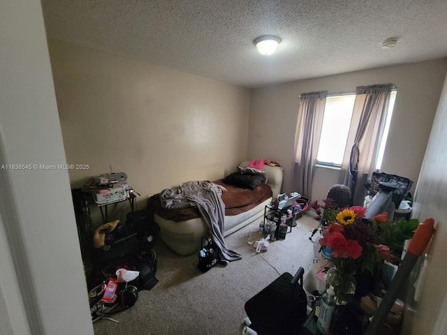 1640 NE 5th St, Homestead, FL 33033 - unfurnished bedroom with carpet flooring and a textured ceiling