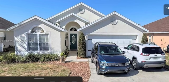 177 Heather Lynn, Davenport, FL 33897 - ranch-style home featuring driveway, an attached garage, and stucco siding