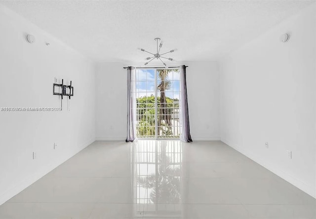 1919 Van Buren St Unit 505A, Hollywood, FL 33020 - unfurnished room featuring tile patterned floors and a smoke detector