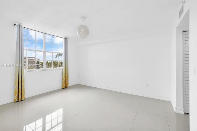 1919 Van Buren St Unit 505A, Hollywood, FL 33020 - empty room featuring baseboards and tile patterned floors