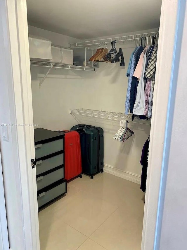 1919 Van Buren St Unit 505A, Hollywood, FL 33020 - walk in closet featuring light tile patterned floors