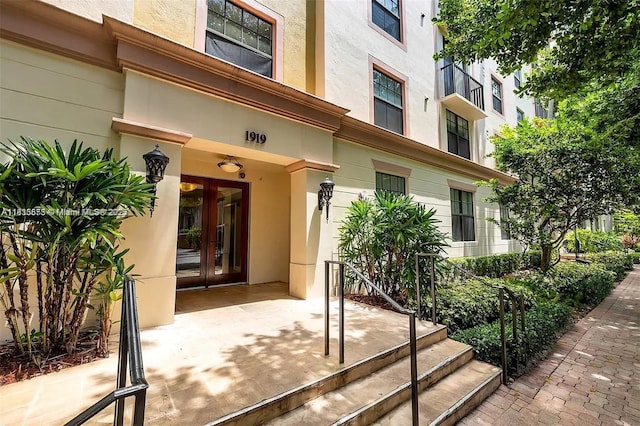 1919 Van Buren St Unit 505A, Hollywood, FL 33020 - view of exterior entry featuring french doors and stucco siding