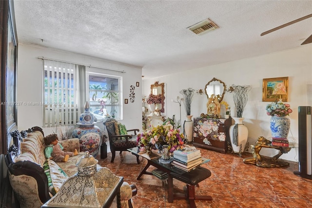 6768 Rose Dr, Miramar, FL 33023 - living area with a textured ceiling and a ceiling fan
