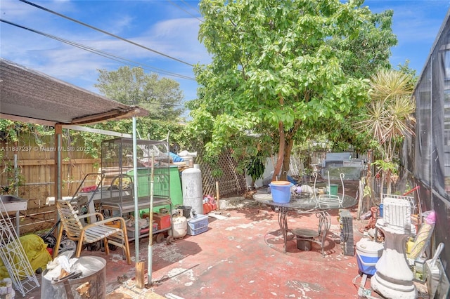 6768 Rose Dr, Miramar, FL 33023 - fenced backyard with a patio area