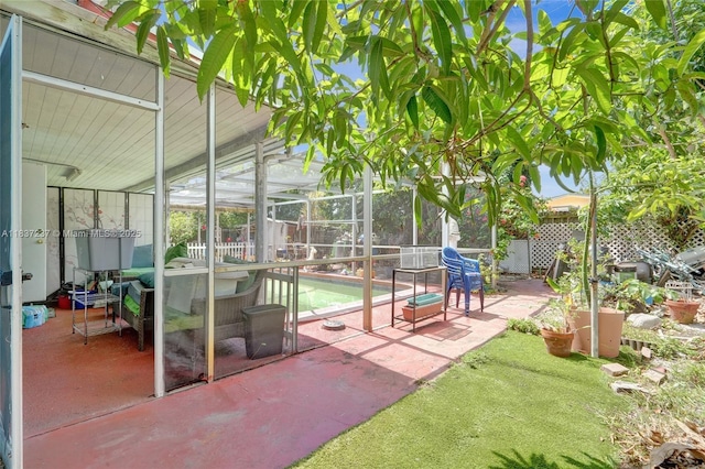 6768 Rose Dr, Miramar, FL 33023 - fenced backyard with a patio and a lanai