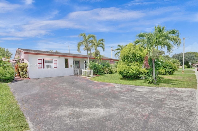 6768 Rose Dr, Miramar, FL 33023 - view of front of property featuring stucco siding and a front yard