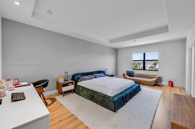 4541 SW 174th Ave, Miramar, FL 33029 - bedroom with a raised ceiling, light wood finished floors, and recessed lighting