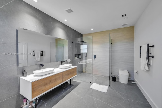 4541 SW 174th Ave, Miramar, FL 33029 - bathroom featuring double vanity, a walk in shower, and tile patterned flooring