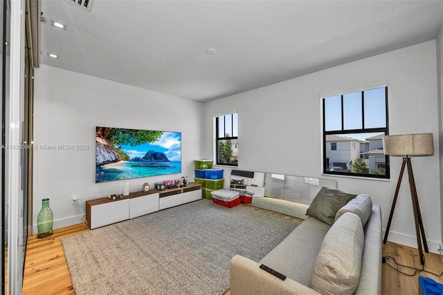 4541 SW 174th Ave, Miramar, FL 33029 - living room featuring wood finished floors and baseboards