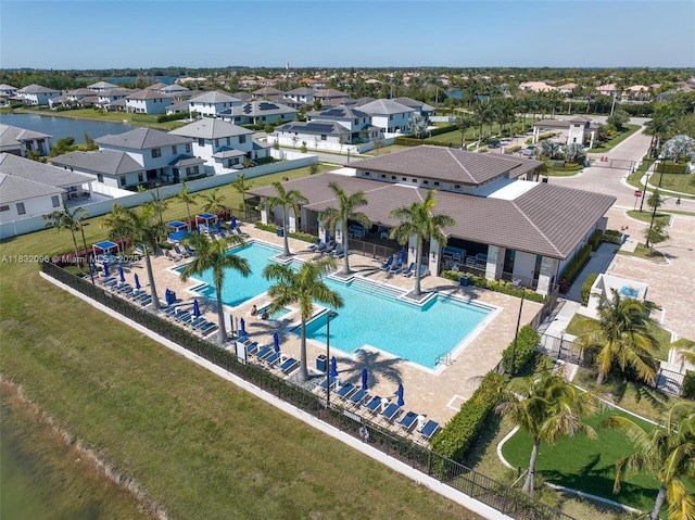 4541 SW 174th Ave, Miramar, FL 33029 - aerial perspective of suburban area with a pool and a large body of water