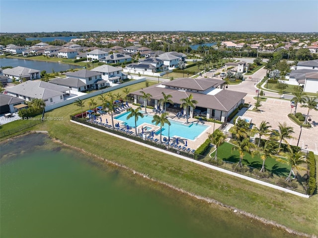 4541 SW 174th Ave, Miramar, FL 33029 - aerial perspective of suburban area featuring a pool area and a nearby body of water