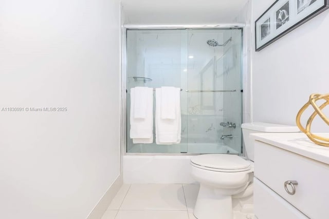 19370 Collins Ave Unit 607, Sunny Isles Beach, FL 33160 - bathroom with tile patterned floors, shower / bath combination with glass door, and vanity