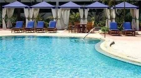 19370 Collins Ave Unit 607, Sunny Isles Beach, FL 33160 - community pool with a gazebo and a patio