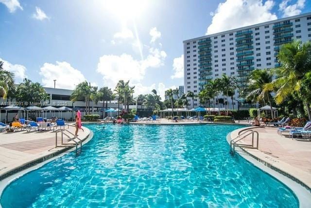 19370 Collins Ave Unit 607, Sunny Isles Beach, FL 33160 - community pool featuring a patio