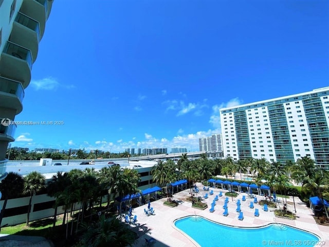 19370 Collins Ave Unit 607, Sunny Isles Beach, FL 33160 - community pool with a patio area and a view of city