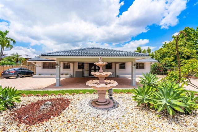 13325 SW 32nd St, Miami, FL 33175 - back of property with a tile roof and stucco siding