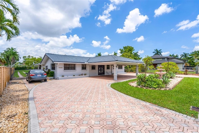 13325 SW 32nd St, Miami, FL 33175 - single story home with decorative driveway, stucco siding, and a tiled roof