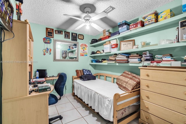 13325 SW 32nd St, Miami, FL 33175 - bedroom with a textured ceiling, tile patterned floors, an office area, and ceiling fan