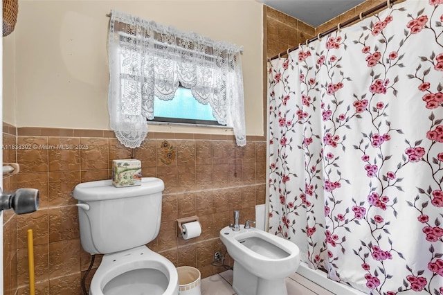 13325 SW 32nd St, Miami, FL 33175 - bathroom with tile walls, a shower stall, a bidet, and wainscoting