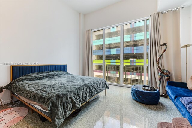 253 NE 2nd St Unit 213, Miami, FL 33132 - carpeted bedroom with access to outside