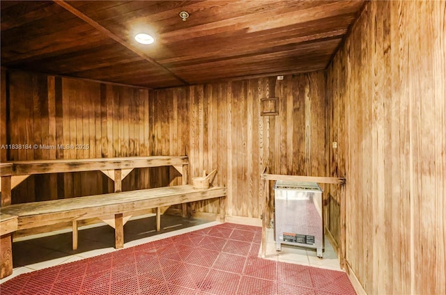 253 NE 2nd St Unit 213, Miami, FL 33132 - relaxing sauna with wooden ceiling, wooden walls, and tile patterned flooring