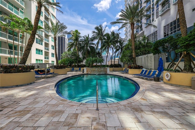 253 NE 2nd St Unit 213, Miami, FL 33132 - community pool with a patio area