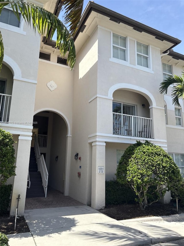 11605 NW 89th St Unit 112, Doral, FL 33178 - view of building exterior featuring stairway